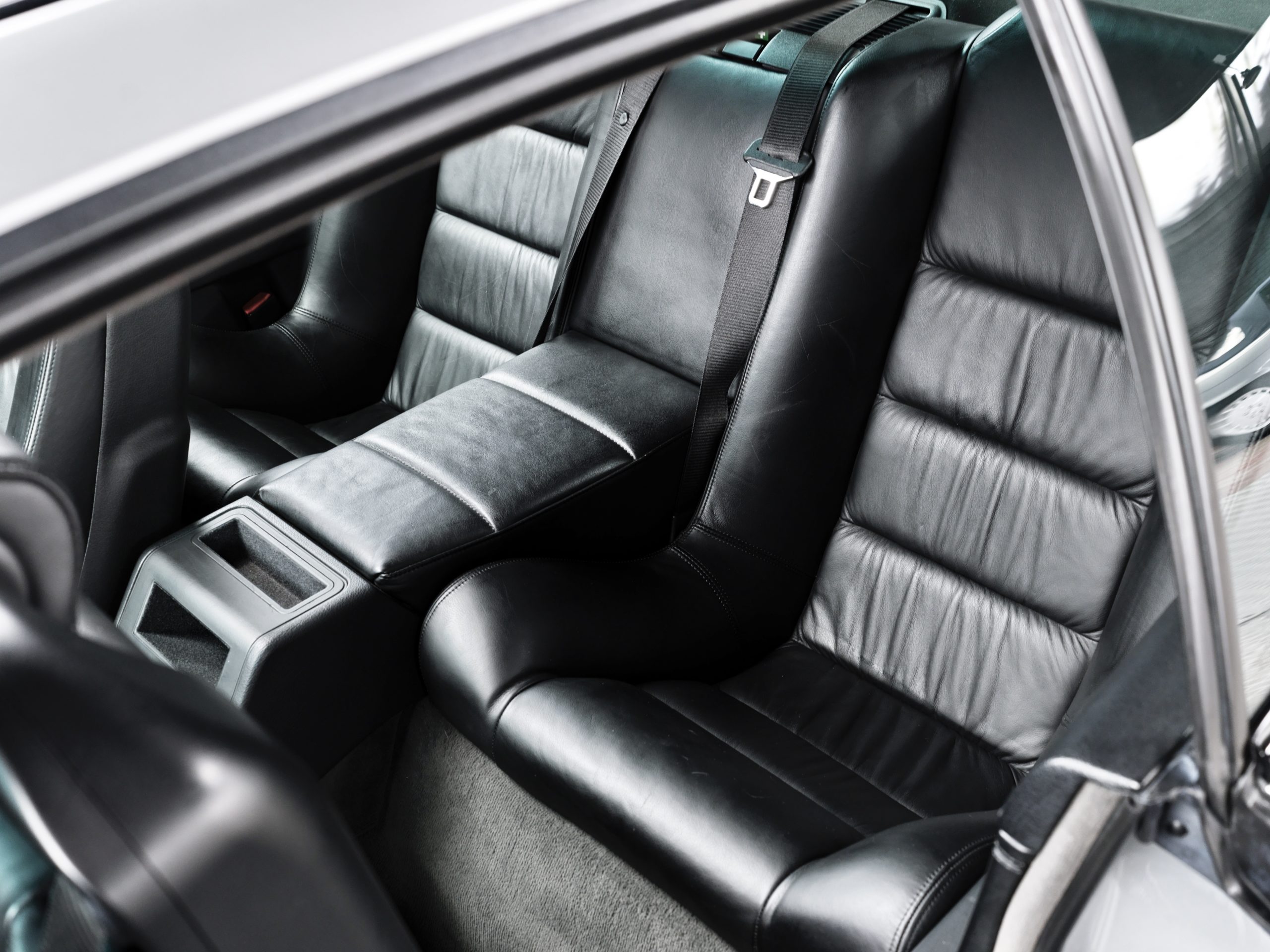 inside view of a 1991 BMW 850i 6 speed manual with black leather seats for sale with Classic 42 Belgium
