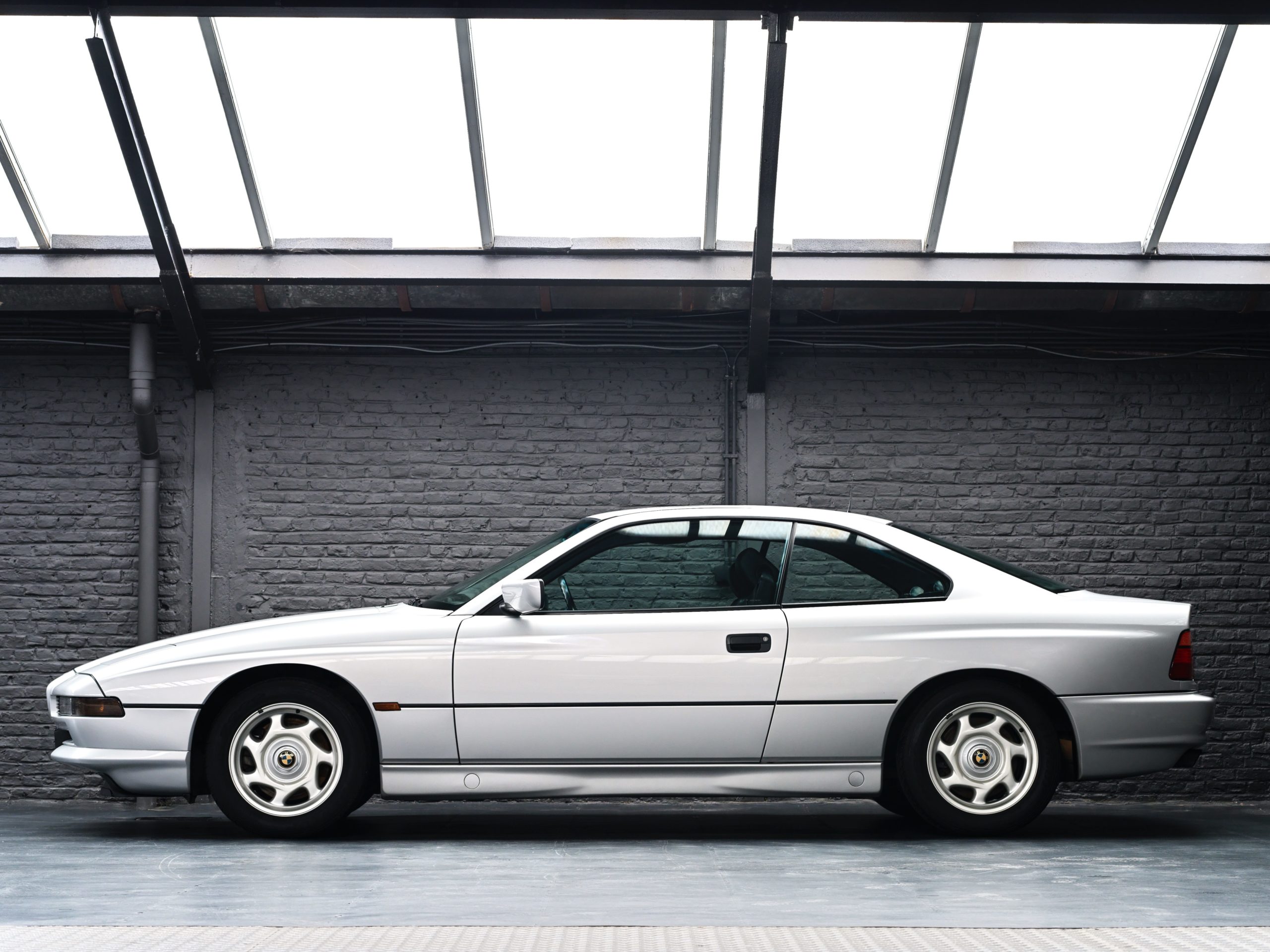 side view of a 1991 BMW 850i 6 speed manual for sale with Classic 42 Belgium