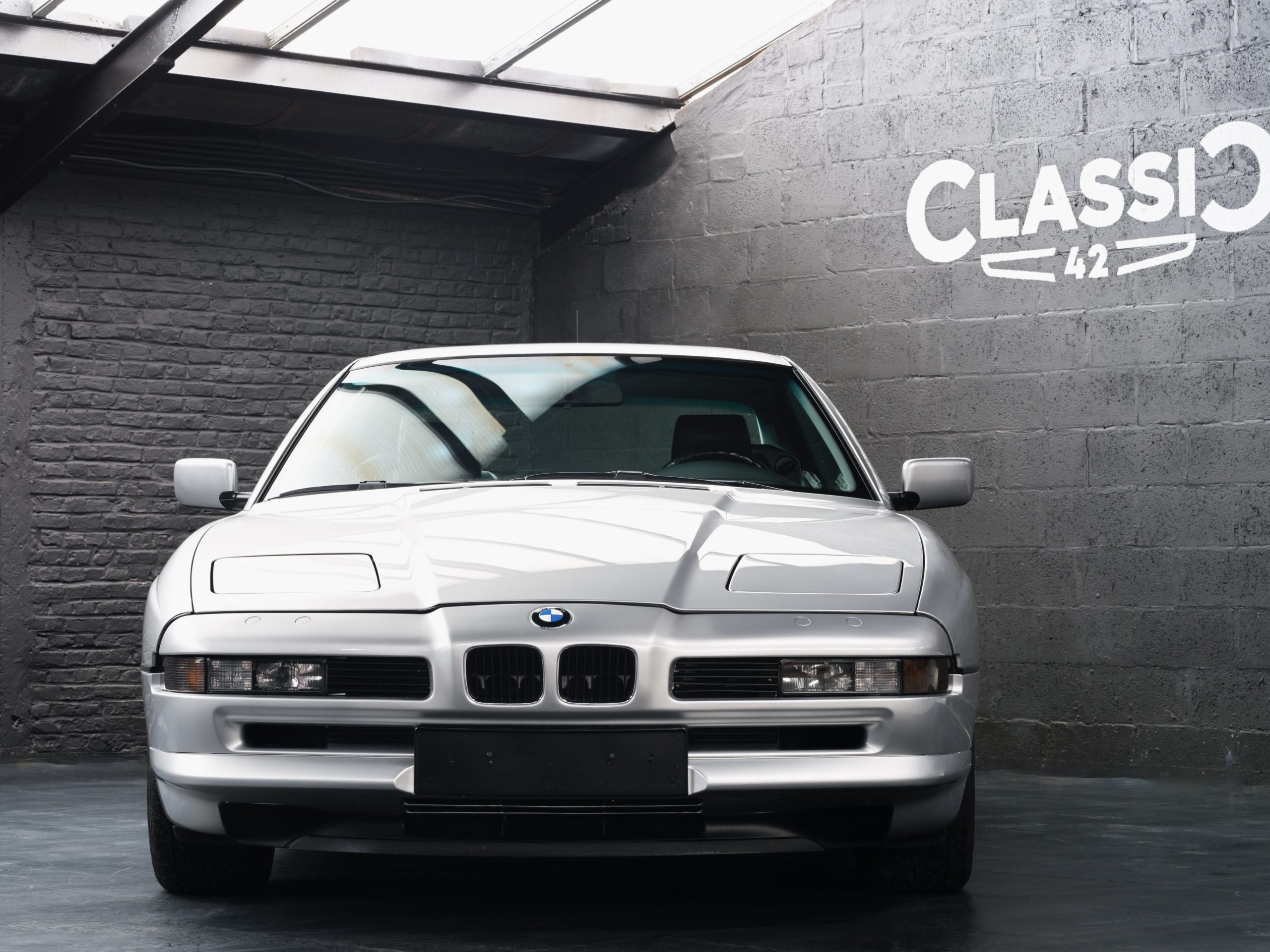 front view of a 1991 BMW 850i 6 speed manual for sale with Classic 42 Belgium