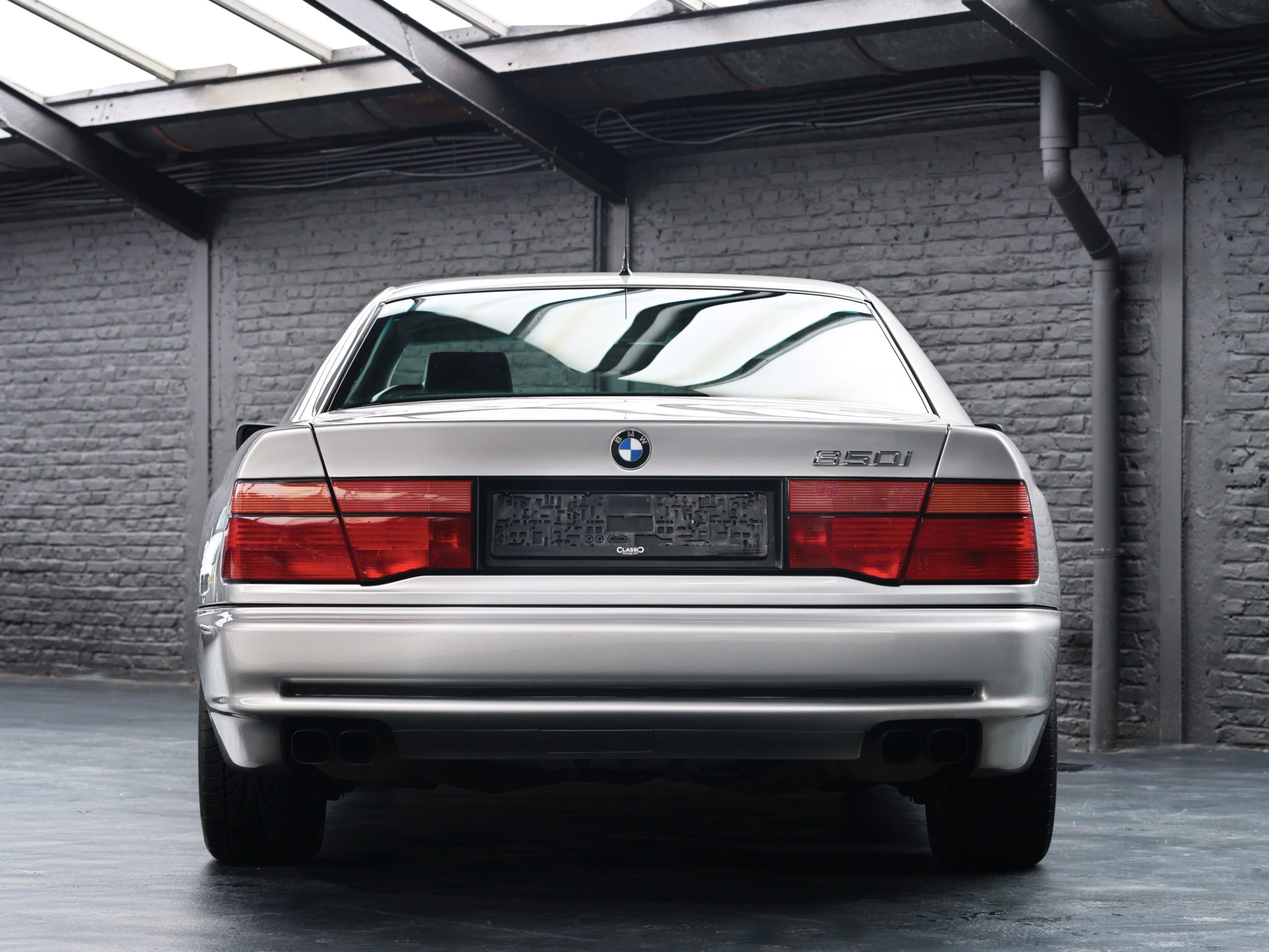 rear view of a 1991 BMW 850i 6 speed manual for sale with Classic 42 Belgium