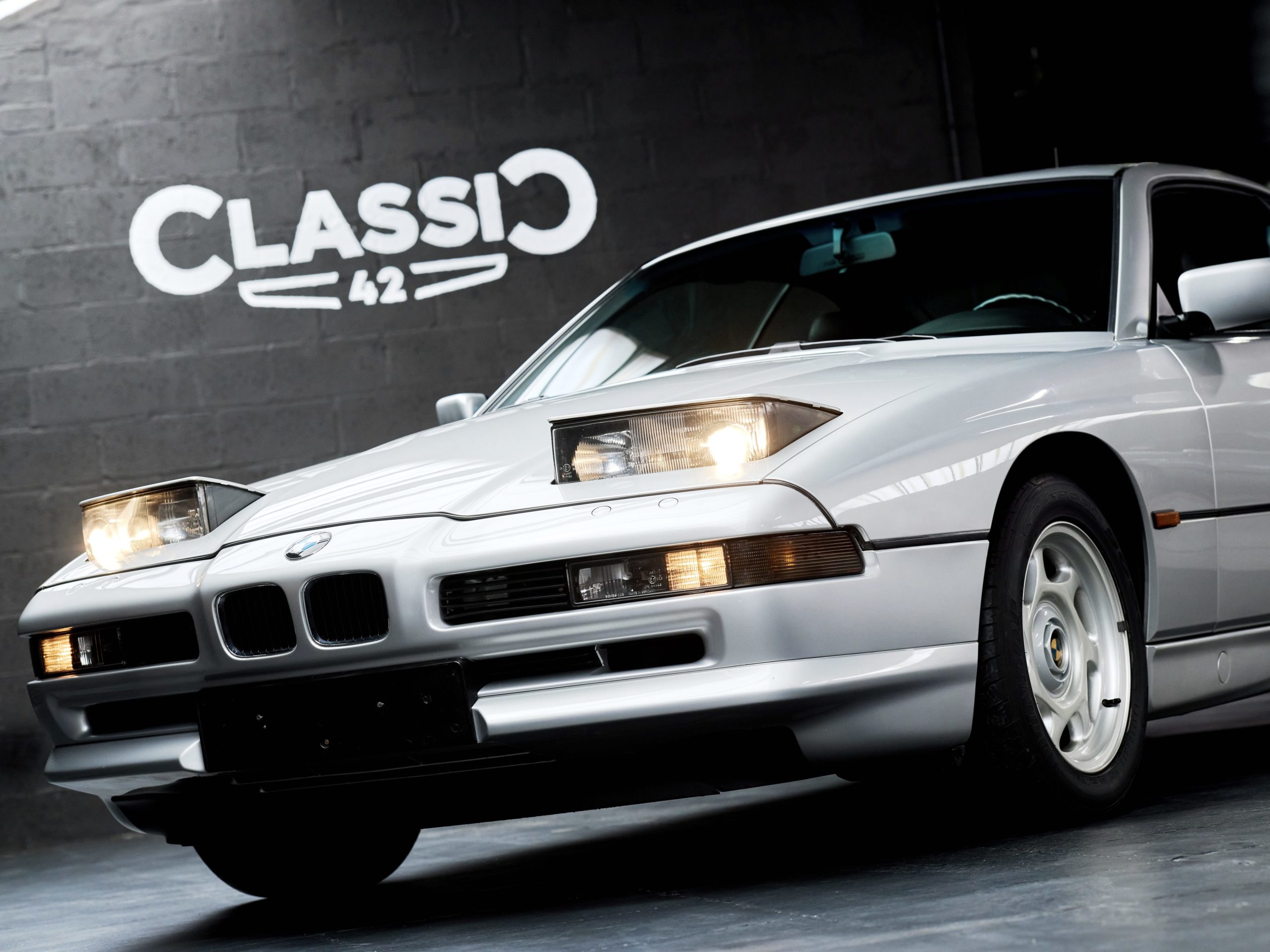 front view of a 1991 BMW 850i 6 speed manual for sale with Classic 42 Belgium