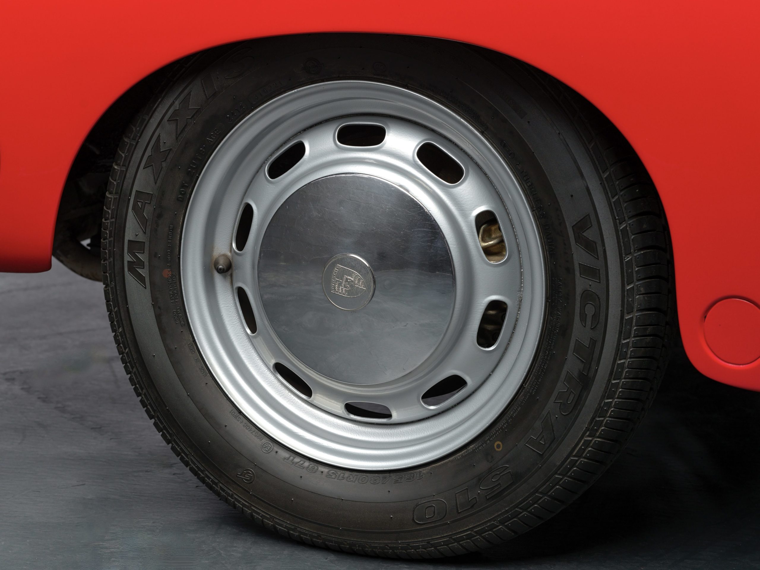 wheel of a 1964 Porsche 356 Convertible for sale at Classic 42