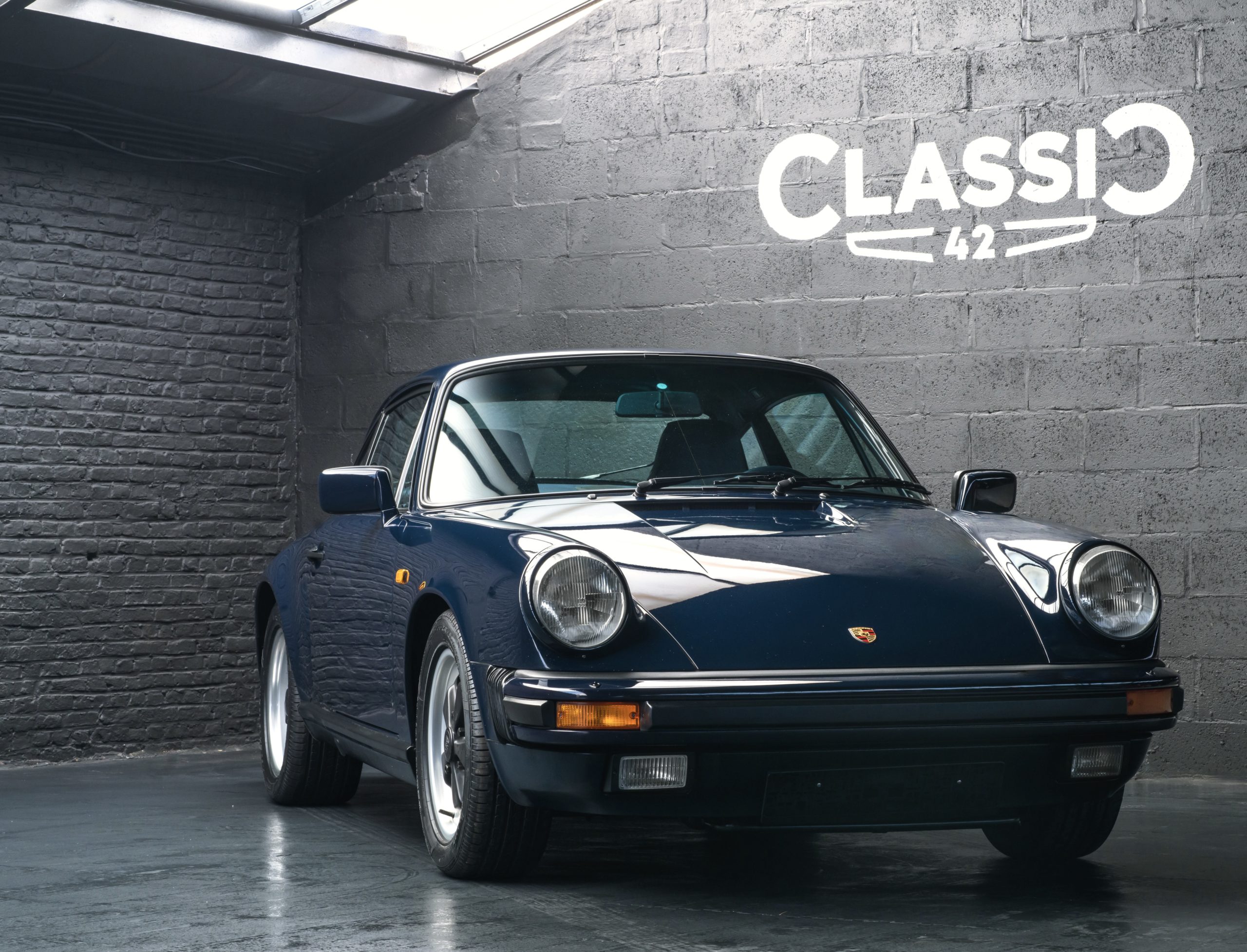 Porsche 911 Carrera 3.2 Coupé bleue de 1986