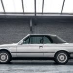 vue latterale d'une BMW 325i Cabriolet de 1990 occasion en vente chez Classic 42 Belgique